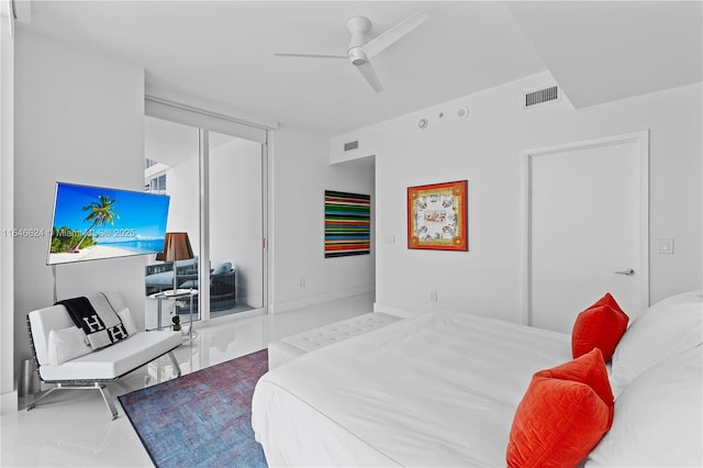 tiled bedroom with ceiling fan