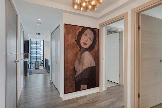 hallway with light wood-type flooring