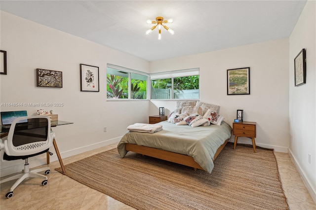 bedroom with baseboards