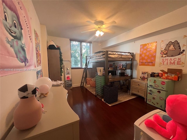 bedroom featuring ceiling fan and hardwood / wood-style flooring