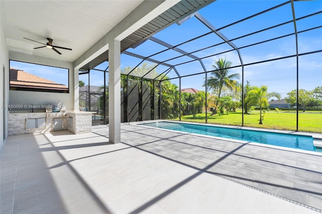 view of swimming pool with a patio area, glass enclosure, a yard, area for grilling, and ceiling fan