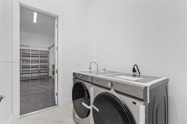 laundry room with separate washer and dryer