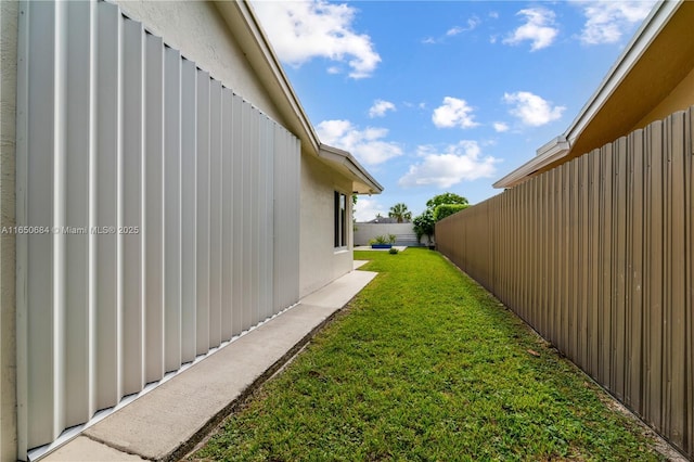 view of yard with a fenced backyard