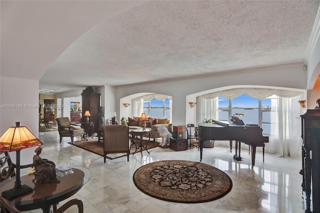 11111 Biscayne Blvd Unit 7F, Miami, FL 33181 - living room featuring marble finish floor, a textured ceiling, and crown molding