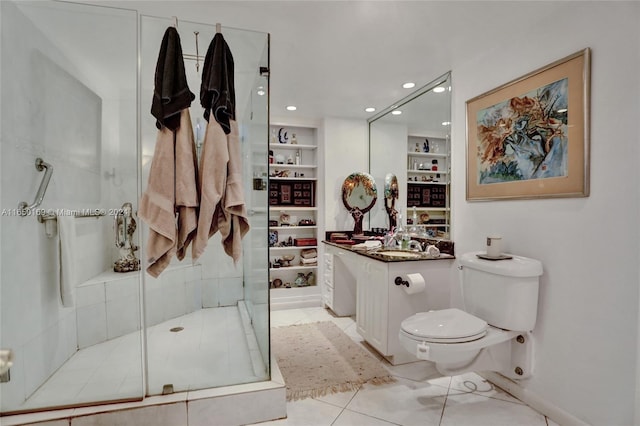 bathroom featuring toilet, an enclosed shower, built in shelves, tile patterned floors, and vanity