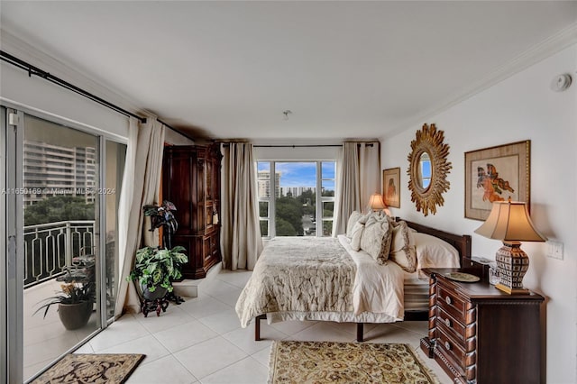 bedroom featuring crown molding, access to exterior, and light tile patterned floors