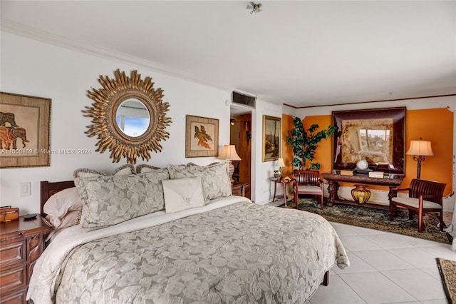 bedroom featuring light tile patterned floors and crown molding