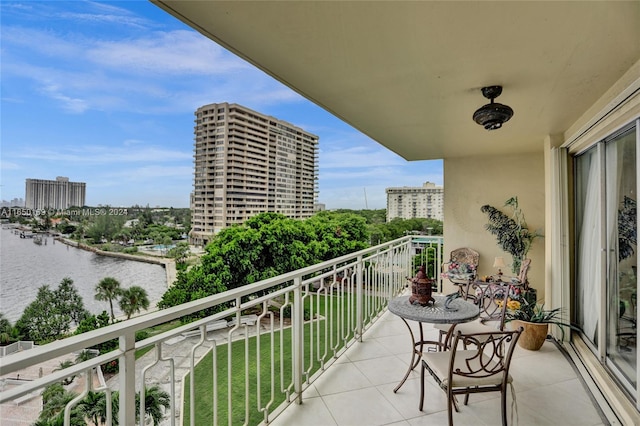 balcony featuring a water view