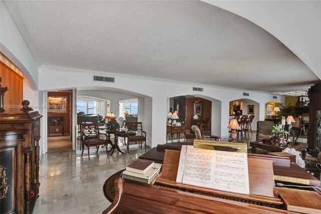 11111 Biscayne Blvd Unit 7F, Miami, FL 33181 - interior space featuring visible vents, arched walkways, and a textured ceiling