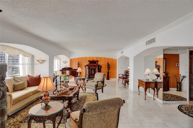 11111 Biscayne Blvd Unit 7F, Miami, FL 33181 - living room with visible vents, arched walkways, vaulted ceiling, and a textured ceiling