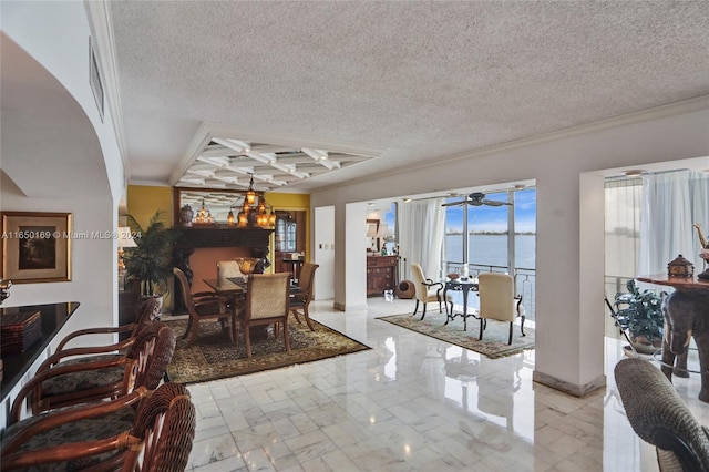 11111 Biscayne Blvd Unit 7F, Miami, FL 33181 - dining space with baseboards, ornamental molding, a textured ceiling, a ceiling fan, and marble finish floor