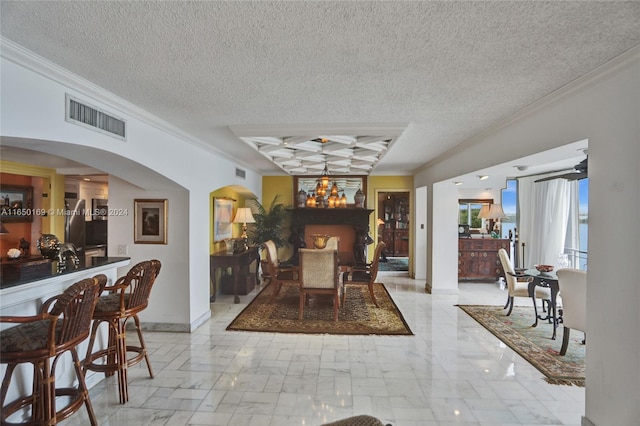 dining area with crown molding, coffered ceiling, beam ceiling, and a textured ceiling