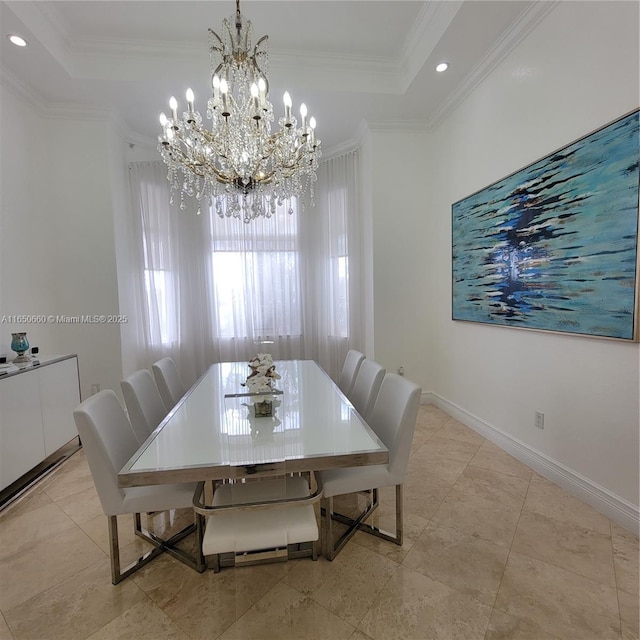 dining area featuring baseboards, ornamental molding, a raised ceiling, and recessed lighting