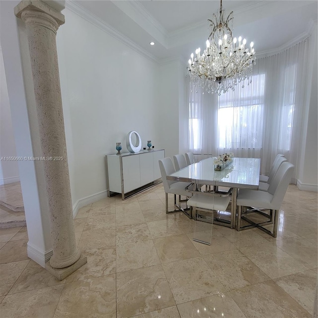 dining room featuring ornamental molding, decorative columns, and baseboards