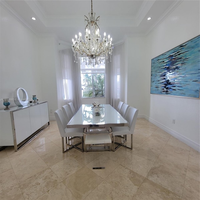 dining space with a tray ceiling, recessed lighting, ornamental molding, a chandelier, and baseboards