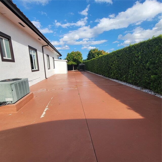 view of patio with central air condition unit