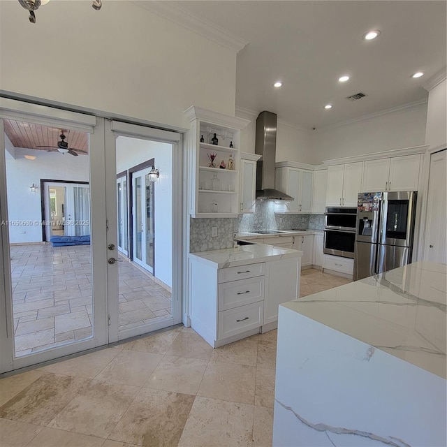 kitchen featuring visible vents, wall chimney exhaust hood, appliances with stainless steel finishes, french doors, and open shelves