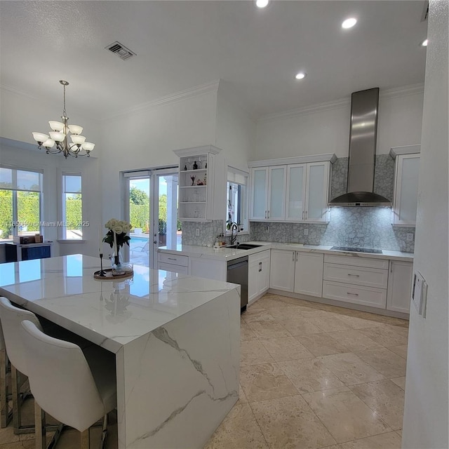 kitchen featuring crown molding, open shelves, visible vents, backsplash, and wall chimney range hood