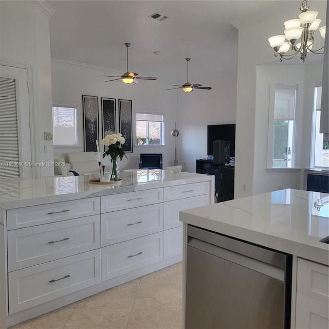 kitchen featuring light tile patterned floors, white cabinets, open floor plan, light stone countertops, and pendant lighting