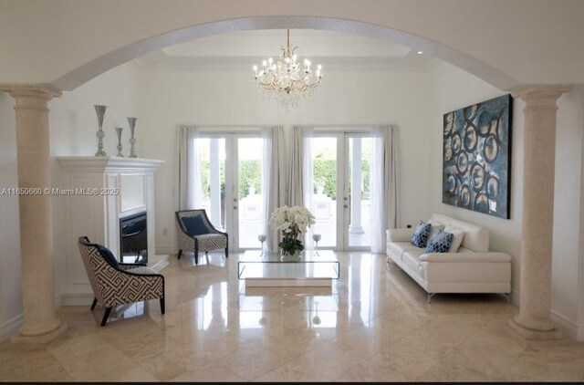 2621 SW 132nd Ave, Miami, FL 33175 - sitting room featuring arched walkways, french doors, and decorative columns