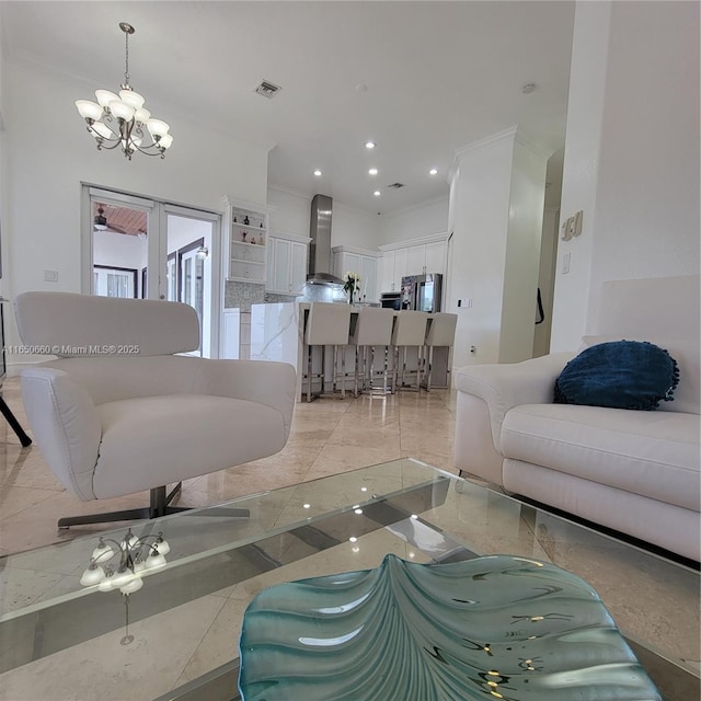 living area with marble finish floor, crown molding, recessed lighting, visible vents, and a chandelier