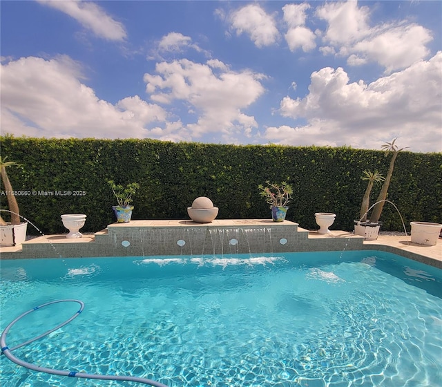 view of pool featuring a fenced in pool