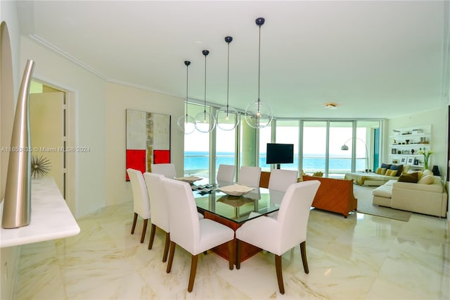 dining space featuring expansive windows and ornamental molding