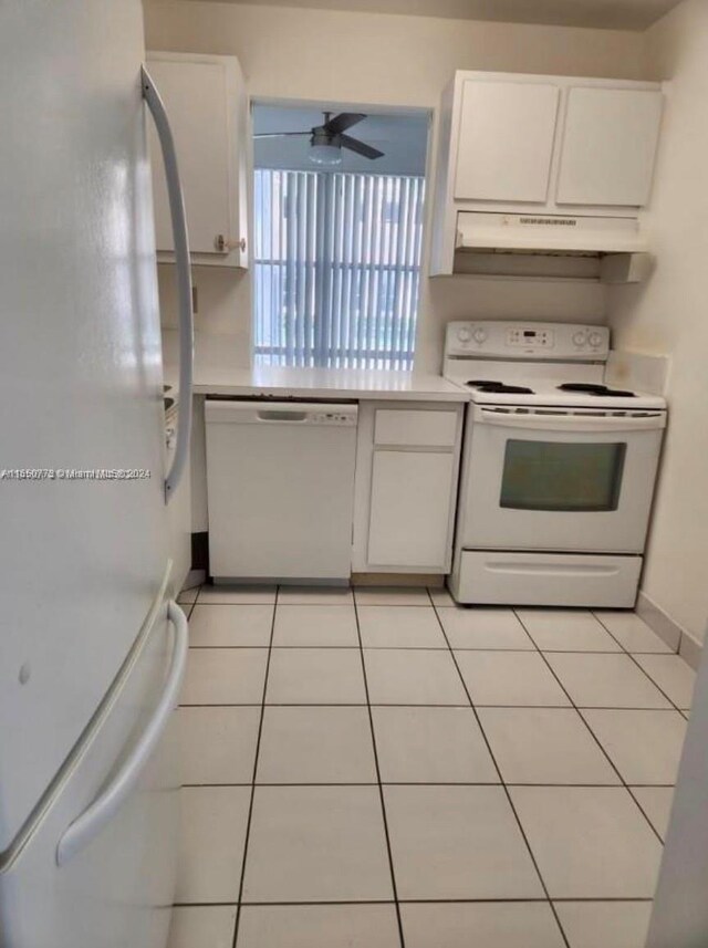 kitchen featuring white cabinets, white appliances, light tile patterned floors, and ceiling fan