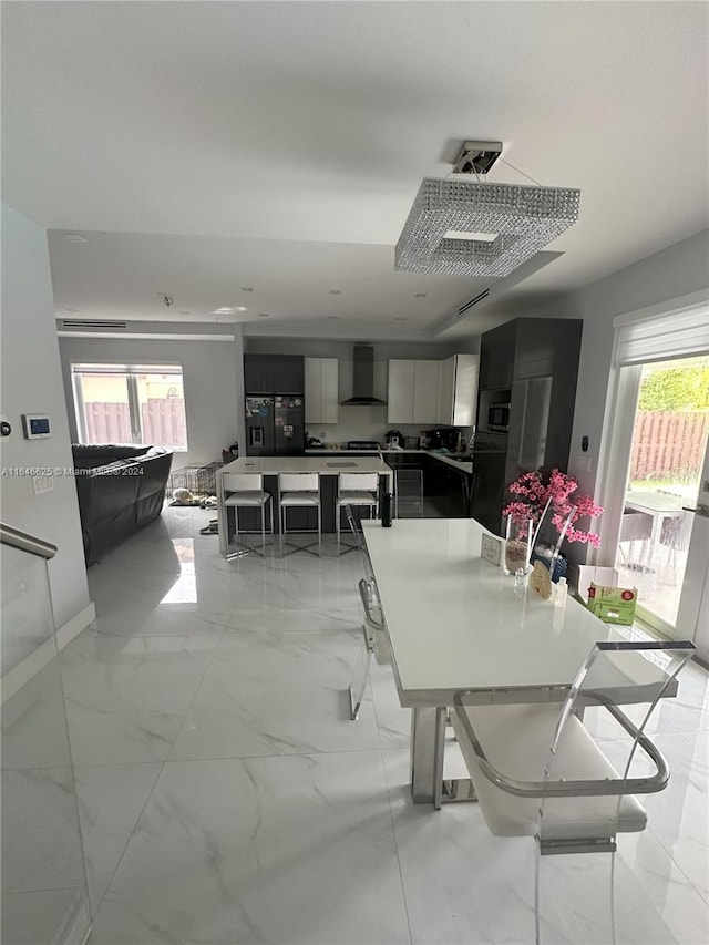 dining room with plenty of natural light