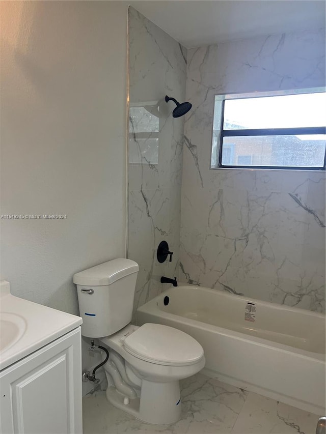 full bathroom with tiled shower / bath combo, vanity, and toilet