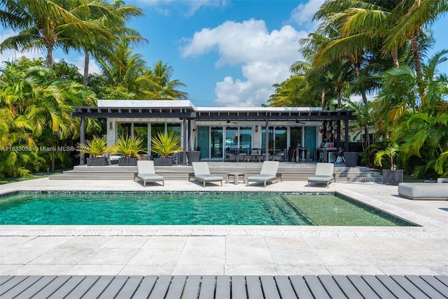 view of swimming pool with a patio