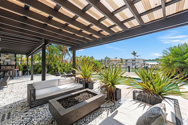 view of patio featuring a fire pit and a pergola