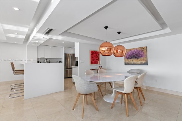 dining room with sink and light tile patterned flooring