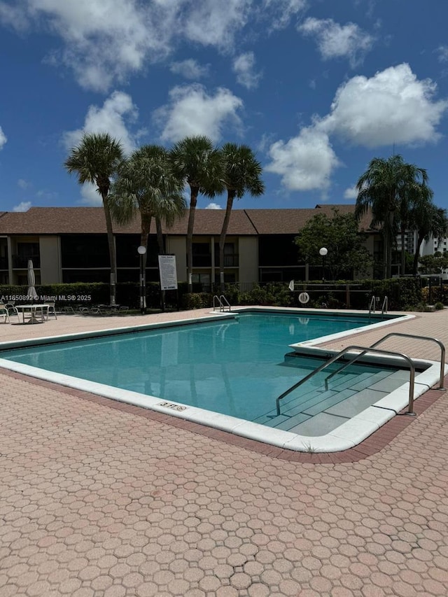 view of pool with a patio area