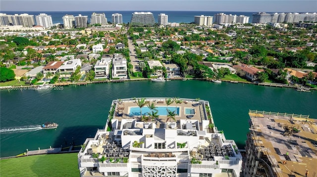 bird's eye view with a water view and a view of city