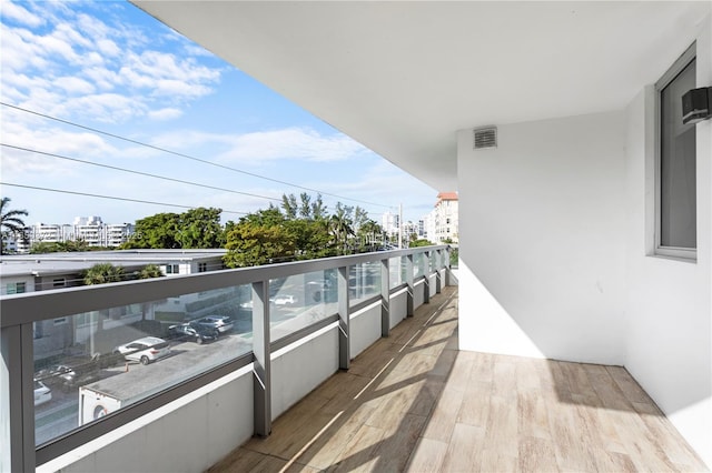 balcony featuring a city view