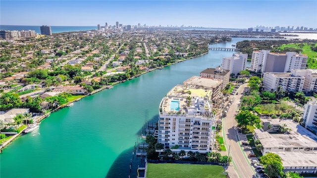 aerial view featuring a water view and a city view