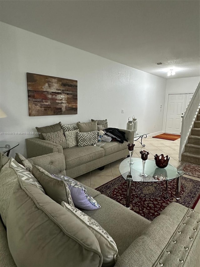 living room featuring light tile patterned floors