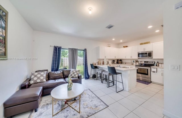 tiled living room with sink