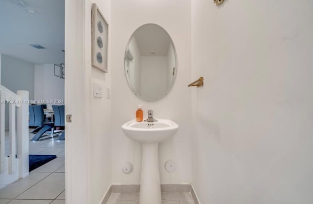 bathroom with tile patterned flooring and sink