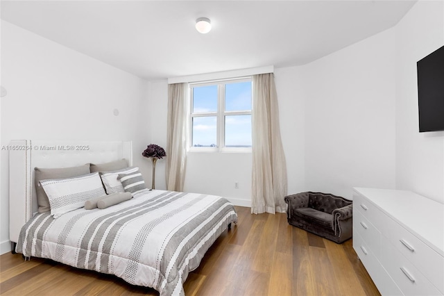 bedroom featuring hardwood / wood-style floors