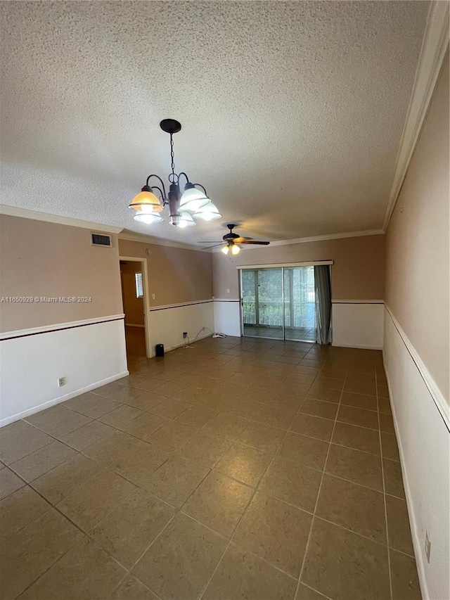 unfurnished living room featuring a textured ceiling, ornamental molding, ceiling fan with notable chandelier, and tile patterned floors