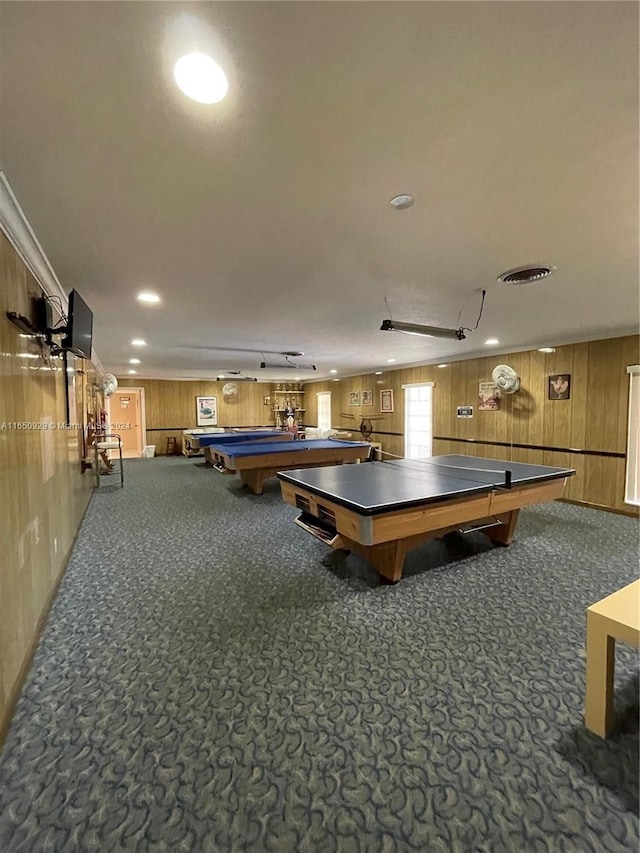 recreation room featuring carpet flooring, pool table, and wooden walls