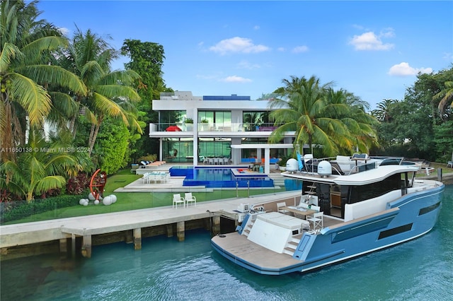 back of house featuring a water view