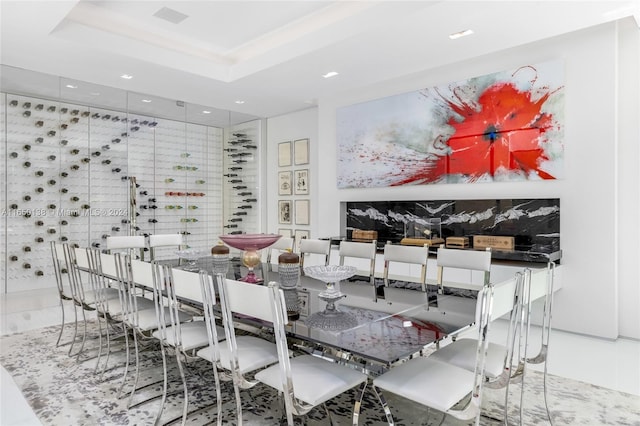 dining area with a tray ceiling