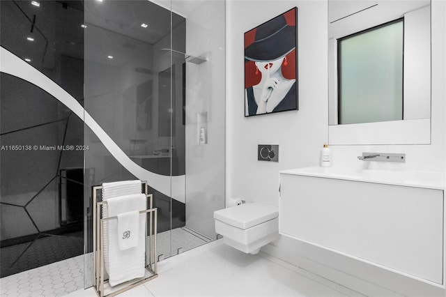 bathroom with vanity, an enclosed shower, and toilet