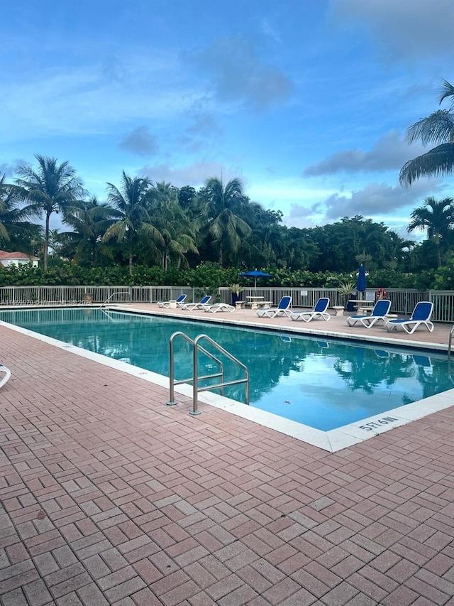 view of pool featuring a patio