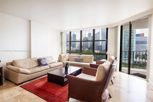 living room with floor to ceiling windows