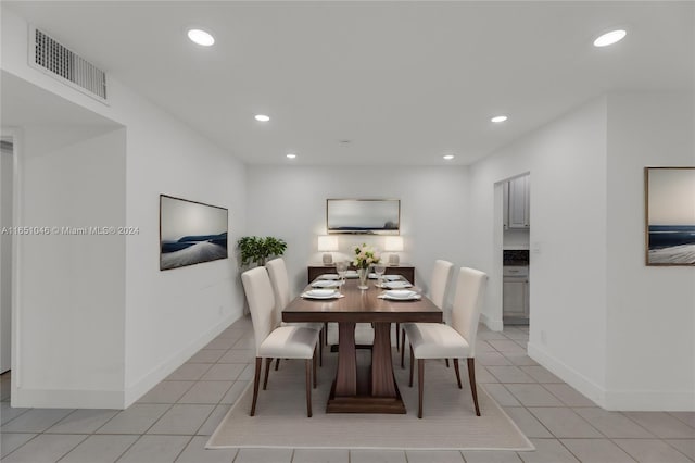 dining area featuring light tile patterned floors