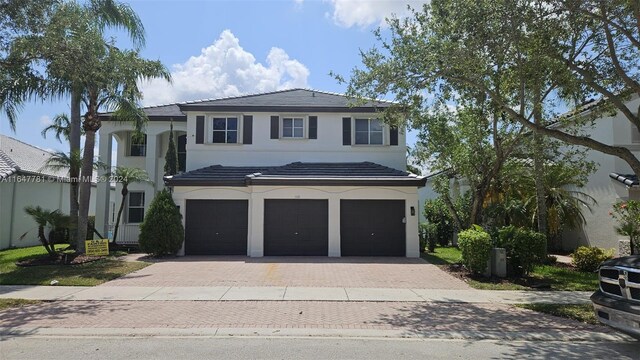 view of front of home featuring a garage